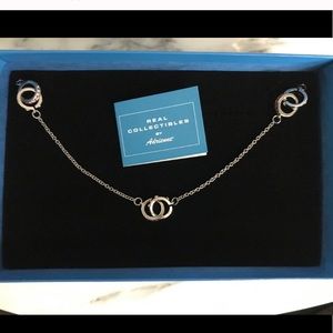 Real Collectibles by Adrienne interlocking rings